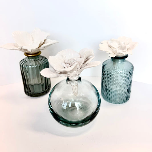 SCULPTED CREAMIC FLOWER BLUE VASE by Gail Williams