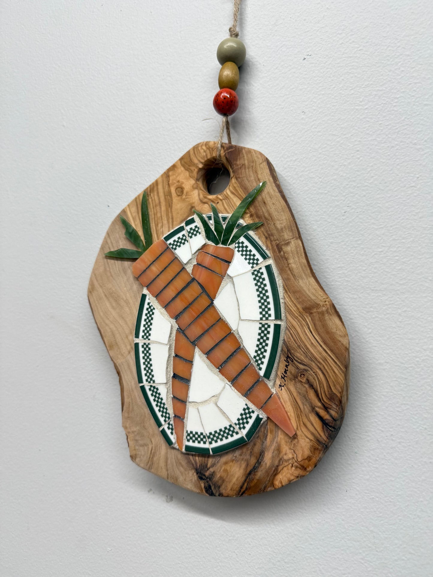 “Olivewood Board Carrots” by Kelsie Hornby
