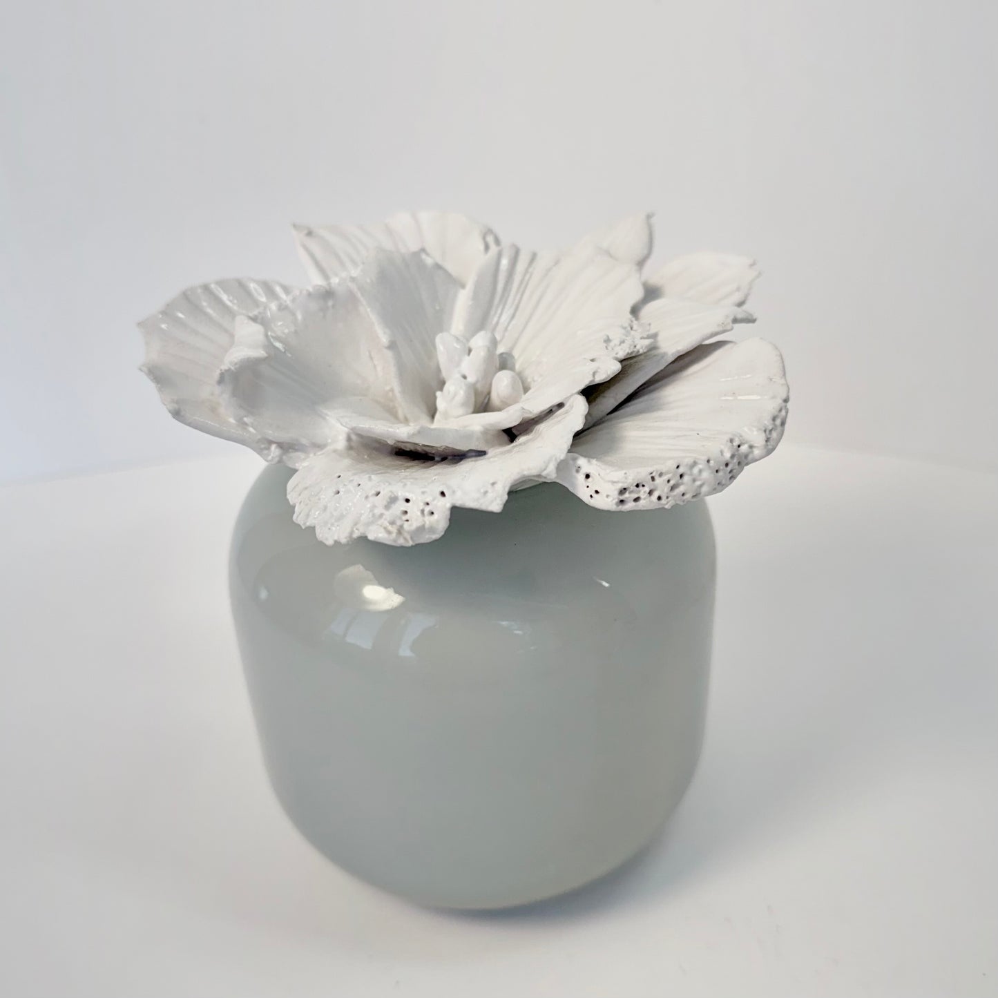 SCULPTED CERAMIC FLOWER in MISTY BLUE VASE by Gail Williams