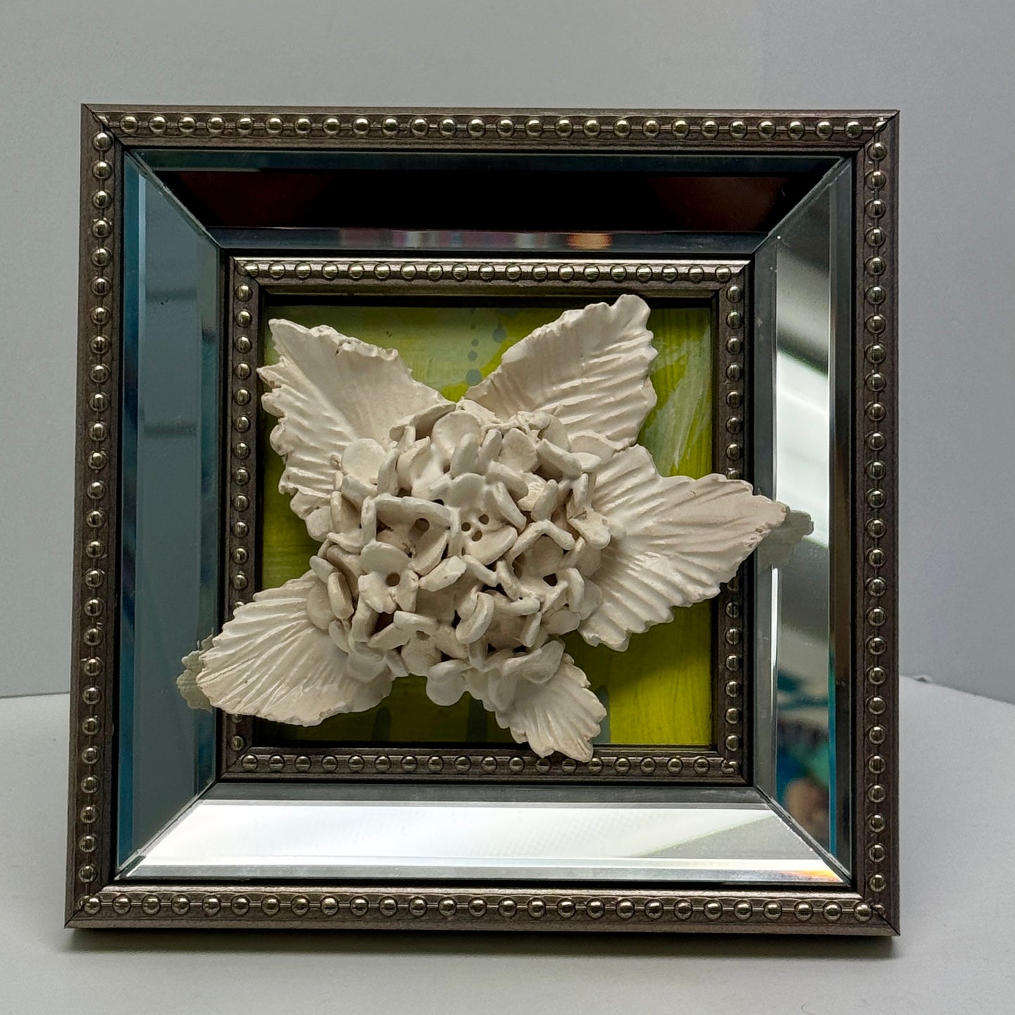 Ceramic Fleur on Mirrored Frame by Gail Williams